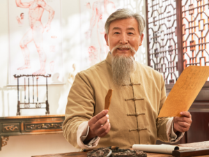 Ancient Traditional Chinese Medicine Practitioner in traditional clothing