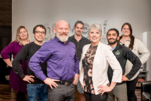photo of the owners and some of the practitioners at Newleaf Total Wellness