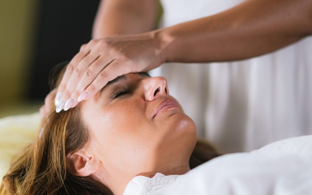 woman receiving the holistic healing practice of cranial sacral therapy