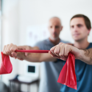 physiotherapist working with a patient doing post-surgery rehabilitation