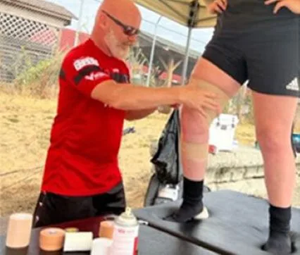 Physiotherapist, Ed working on a rugby player - learning centre